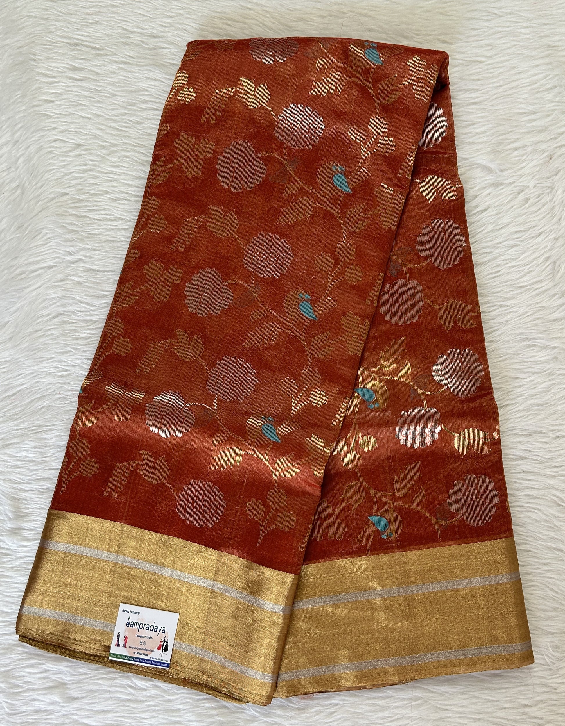 Chanderi Pattu Saree Brick colored saree complemented with a Gold Zari border - Sampradaya Designer Studio