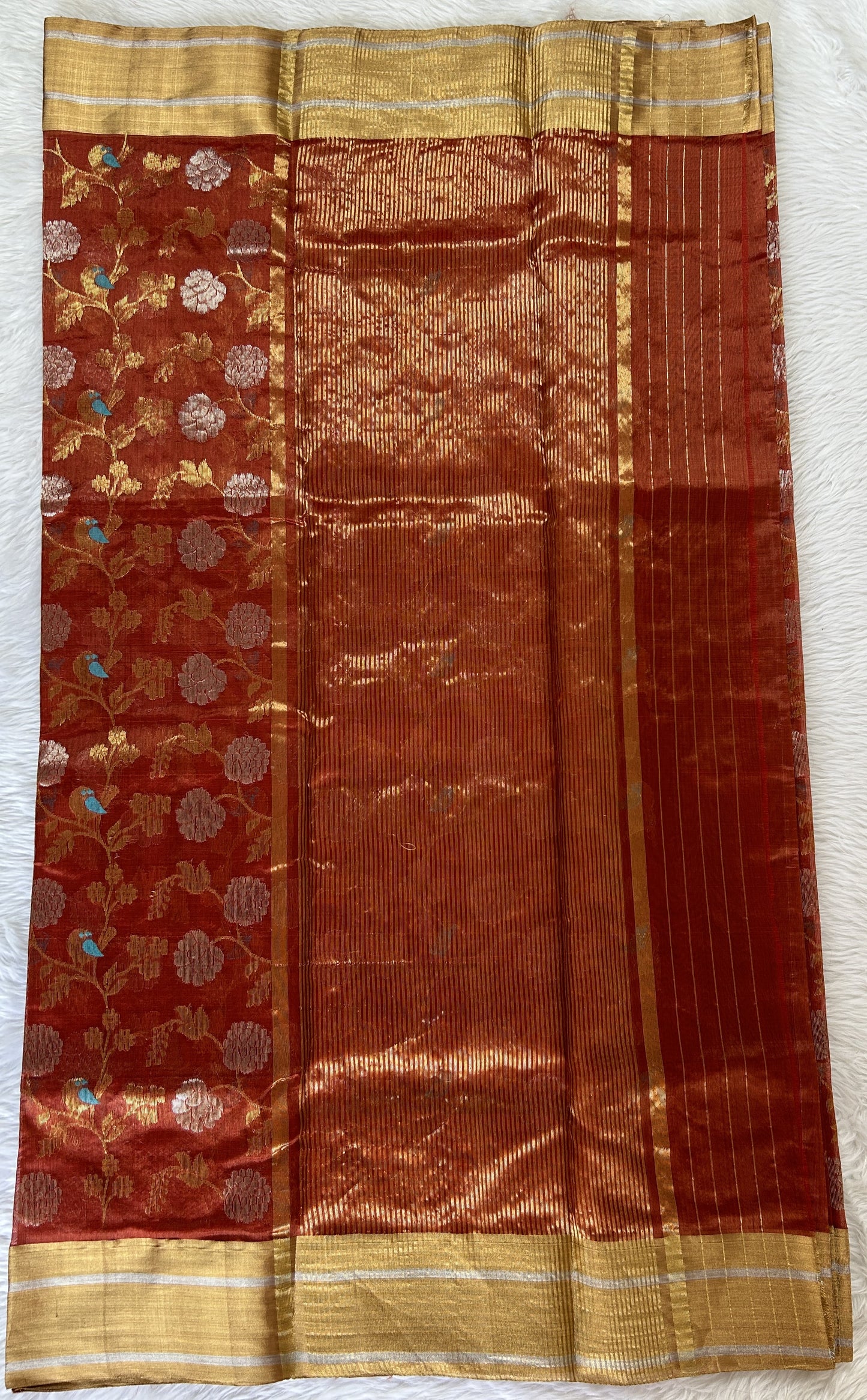Chanderi Pattu Saree Brick colored saree complemented with a Gold Zari border - Sampradaya Designer Studio