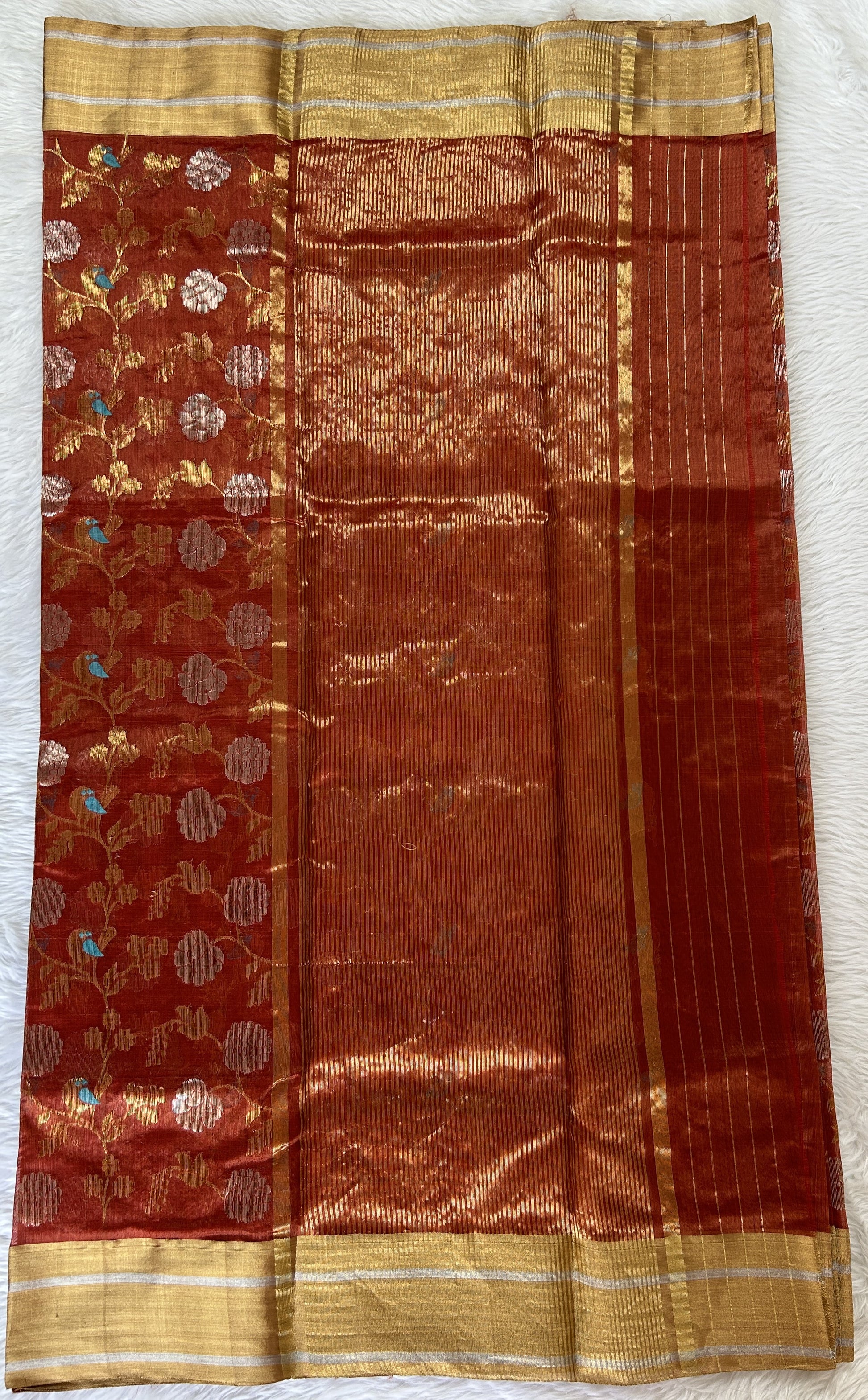 Chanderi Pattu Saree Brick colored saree complemented with a Gold Zari border - Sampradaya Designer Studio