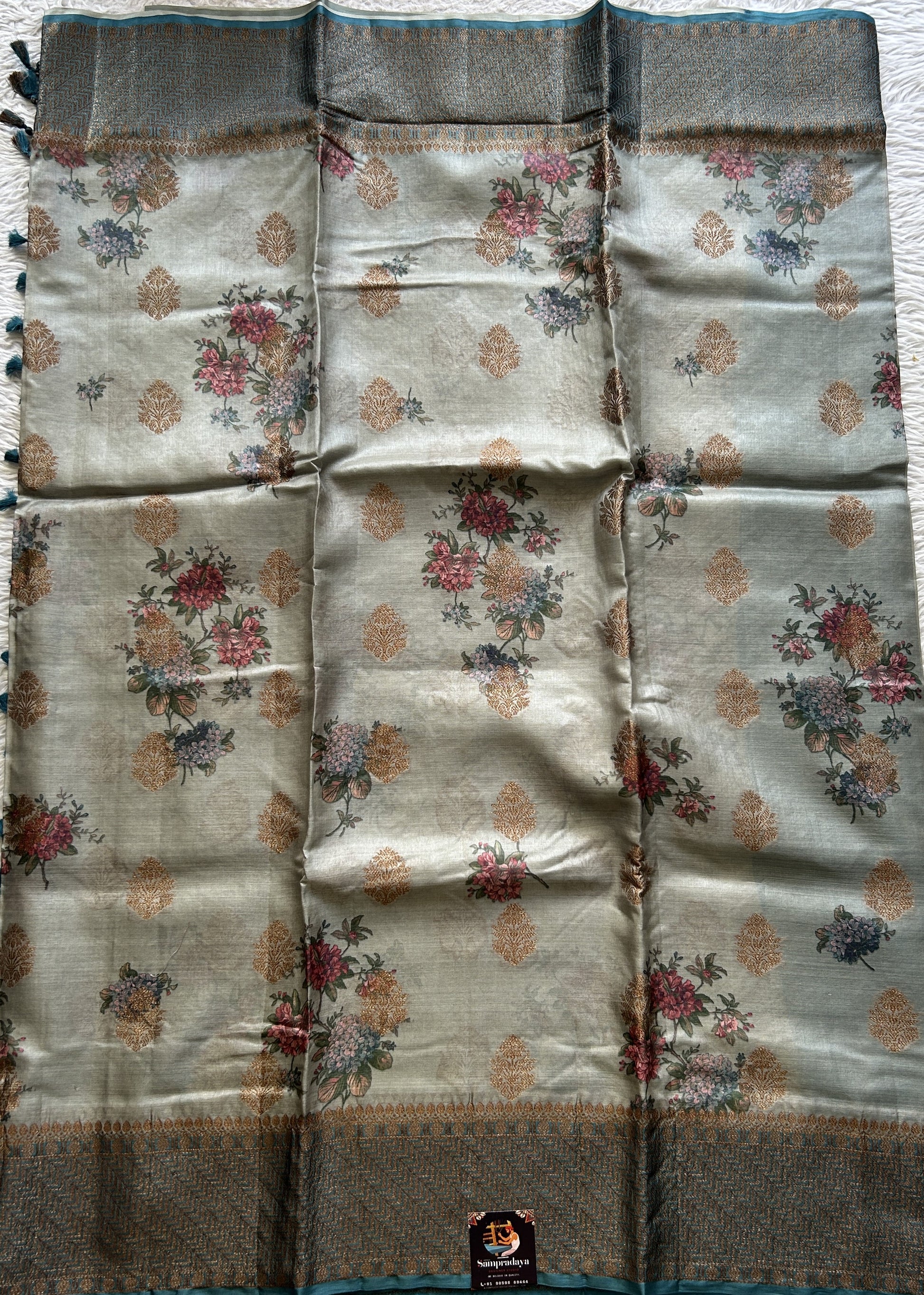 Pure Tussar Silk Saree Light Teal Blue Color Complemented with a Zari Border. - Sampradaya Designer Studio