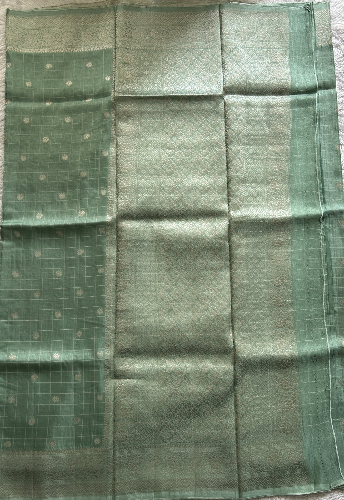 Semi Georgette Saree Sea Green Colored Complemented with a Zari Border. - Sampradaya Designer Studio