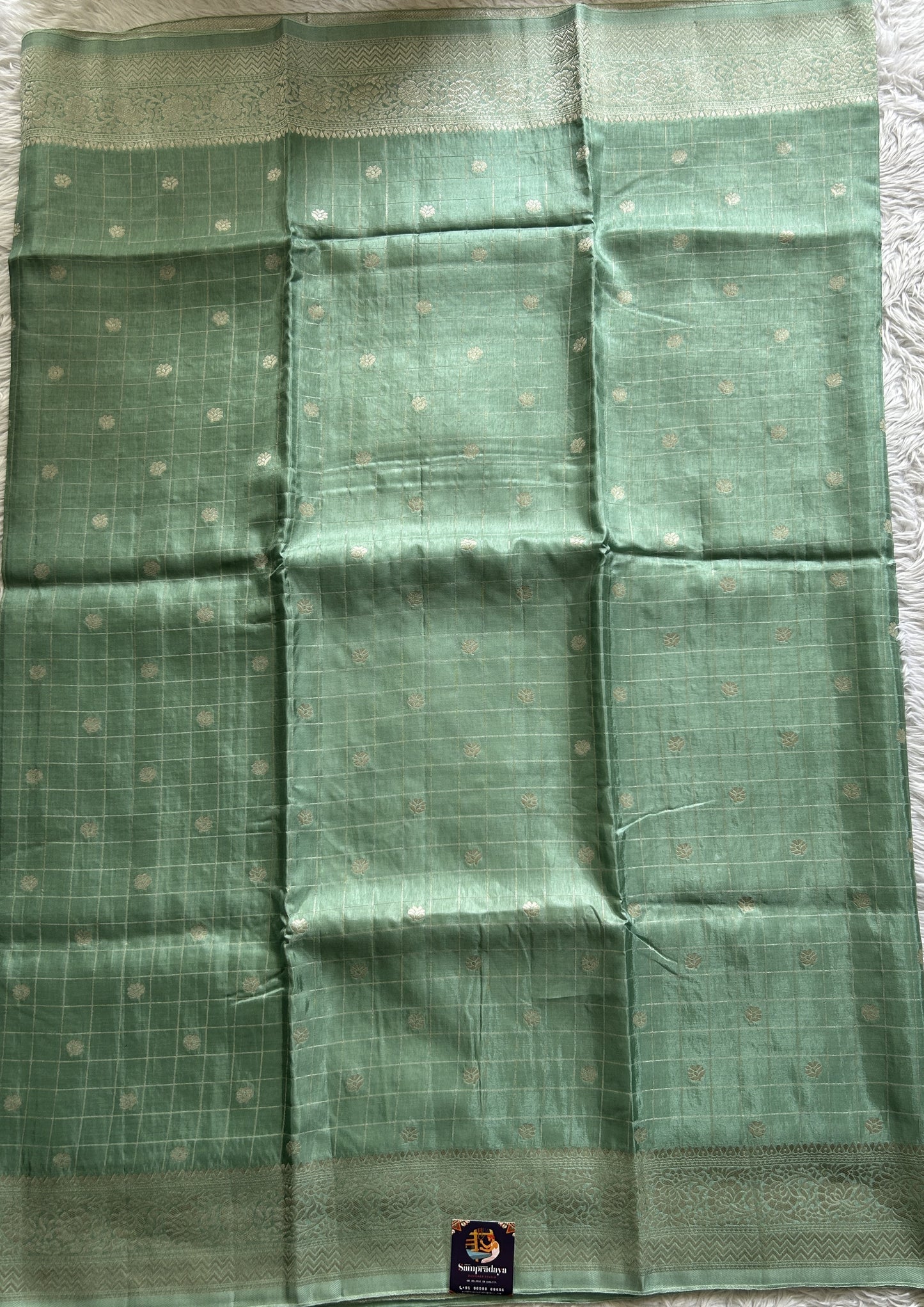 Semi Georgette Saree Sea Green Colored Complemented with a Zari Border. - Sampradaya Designer Studio