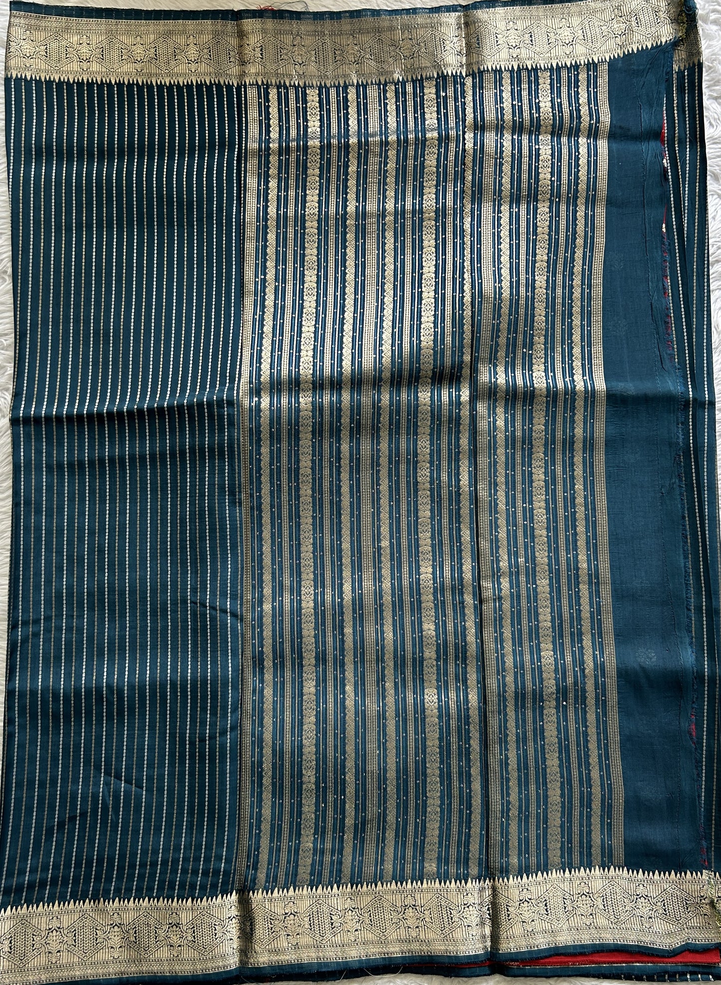 Semi Georgette Saree Peacock Blue Colored Complemented with a Zari Border. - Sampradaya Designer Studio