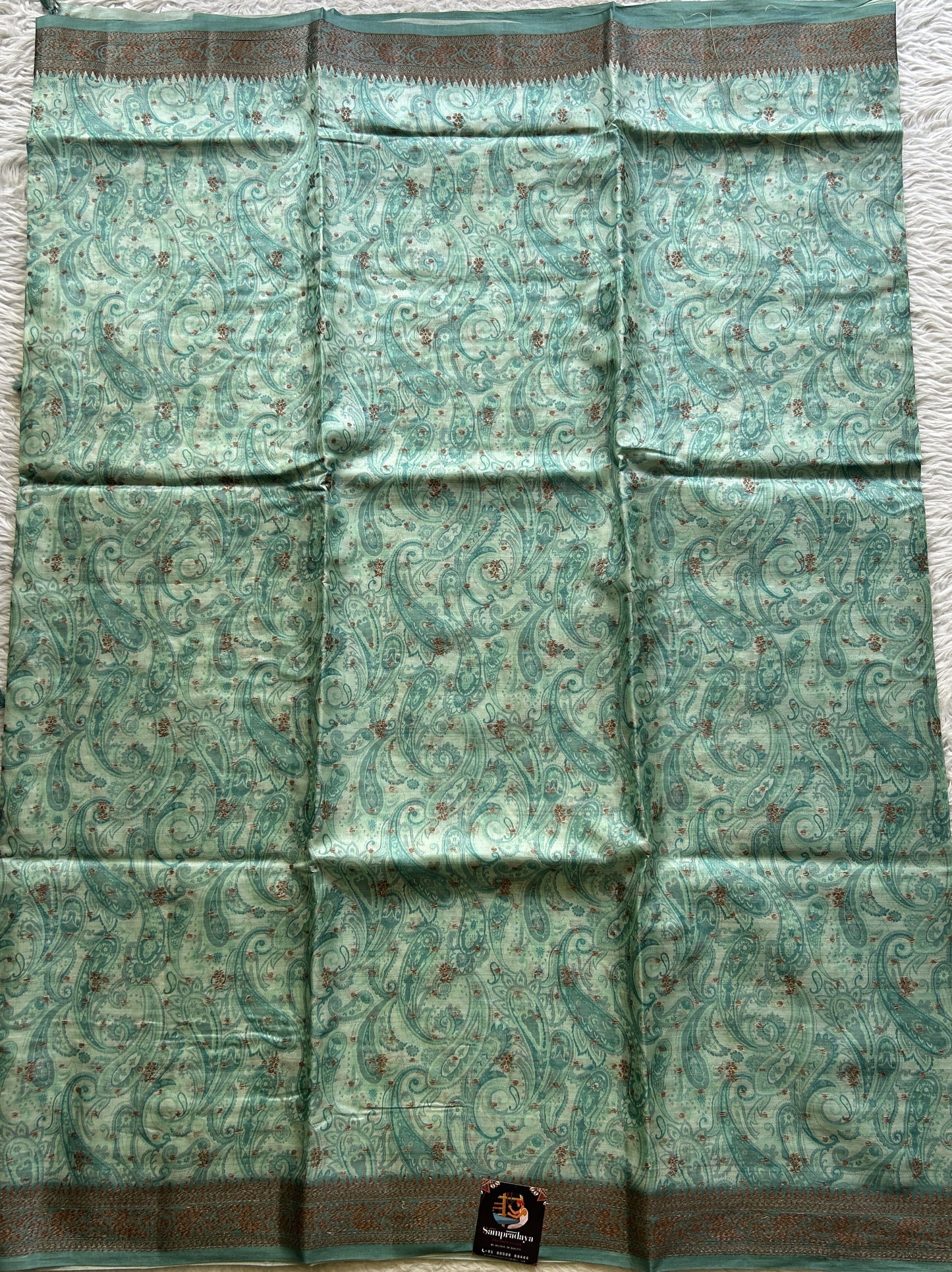 Pure Tussar Silk Saree Light Sea Green Color Complemented with a Zari Border. - Sampradaya Designer Studio