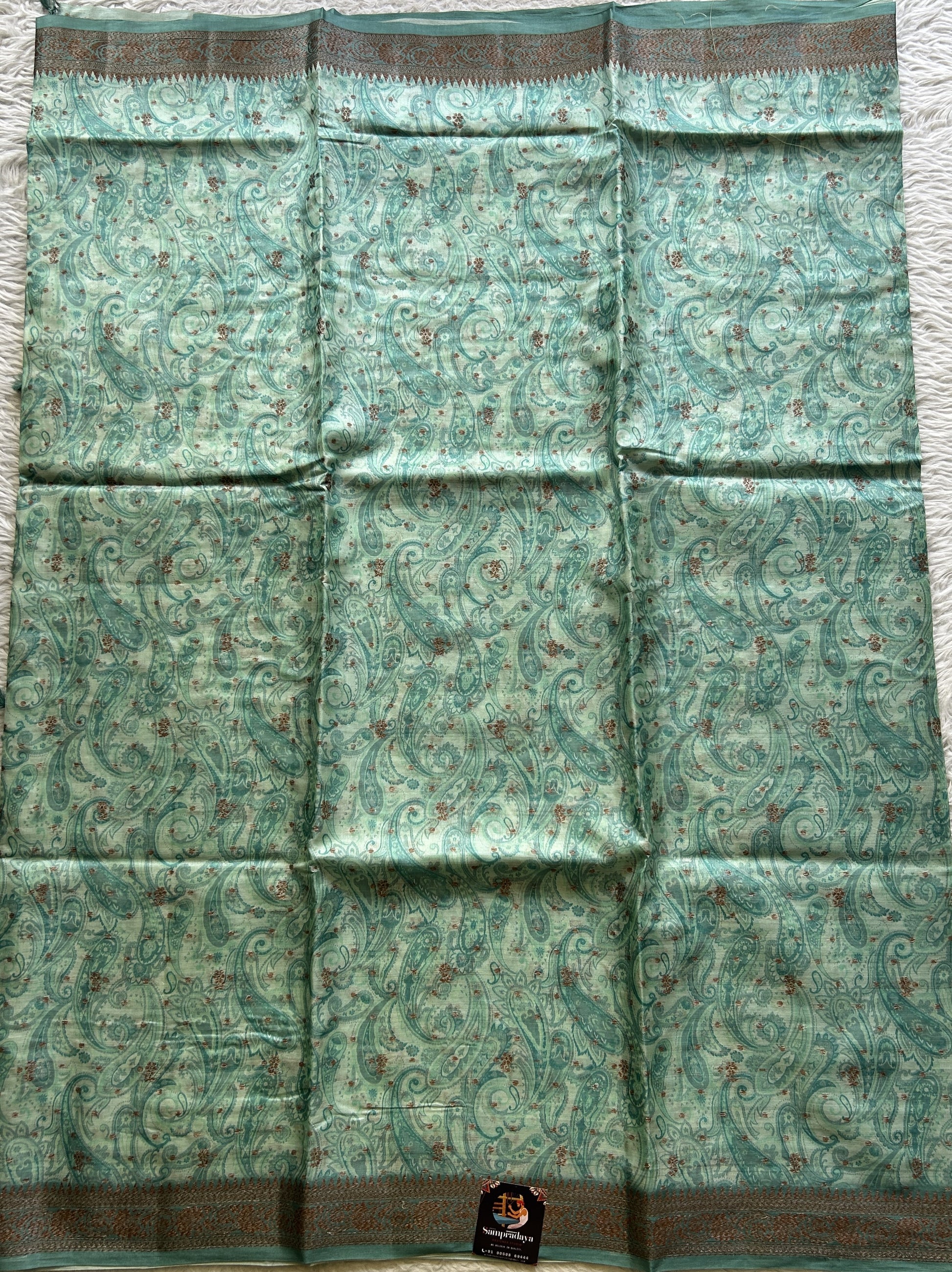 Pure Tussar Silk Saree Light Sea Green Color Complemented with a Zari Border. - Sampradaya Designer Studio