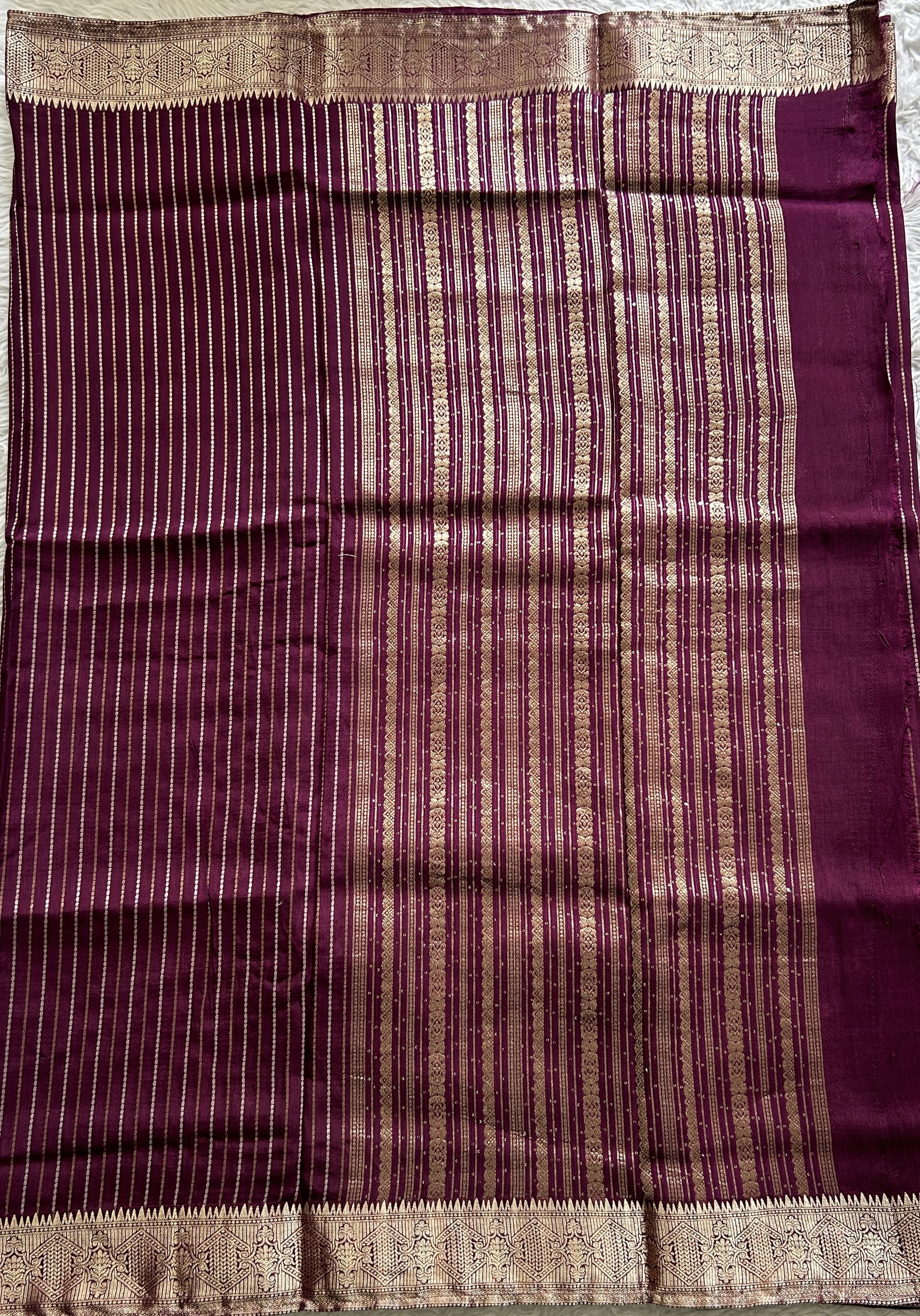 Semi Georgette Saree Purple Colored Complemented with a Zari Border. - Sampradaya Designer Studio