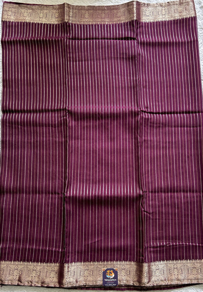 Semi Georgette Saree Purple Colored Complemented with a Zari Border. - Sampradaya Designer Studio