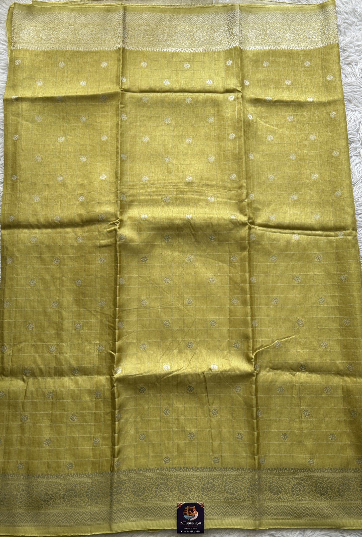 Semi Georgette Saree Yellow Colored Complemented with a Zari Border. - Sampradaya Designer Studio