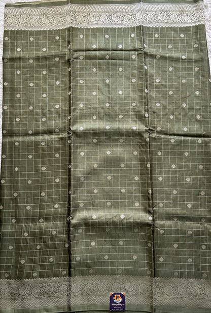 Semi Georgette Saree Olive Green Colored Complemented with a Zari Border. - Sampradaya Designer Studio
