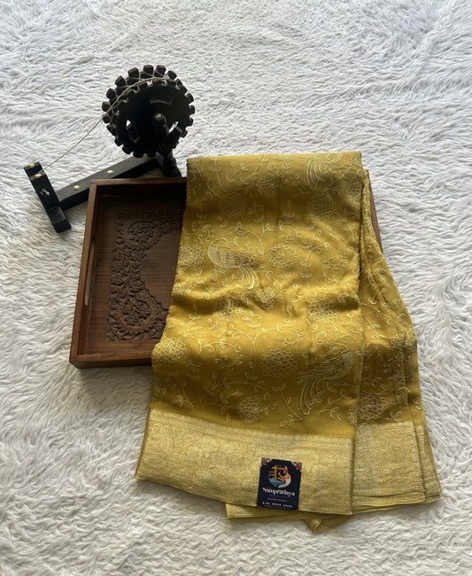 Semi Georgette Saree Canary Colored Elegantly Paired with a Zari Border. - Sampradaya Designer Studio