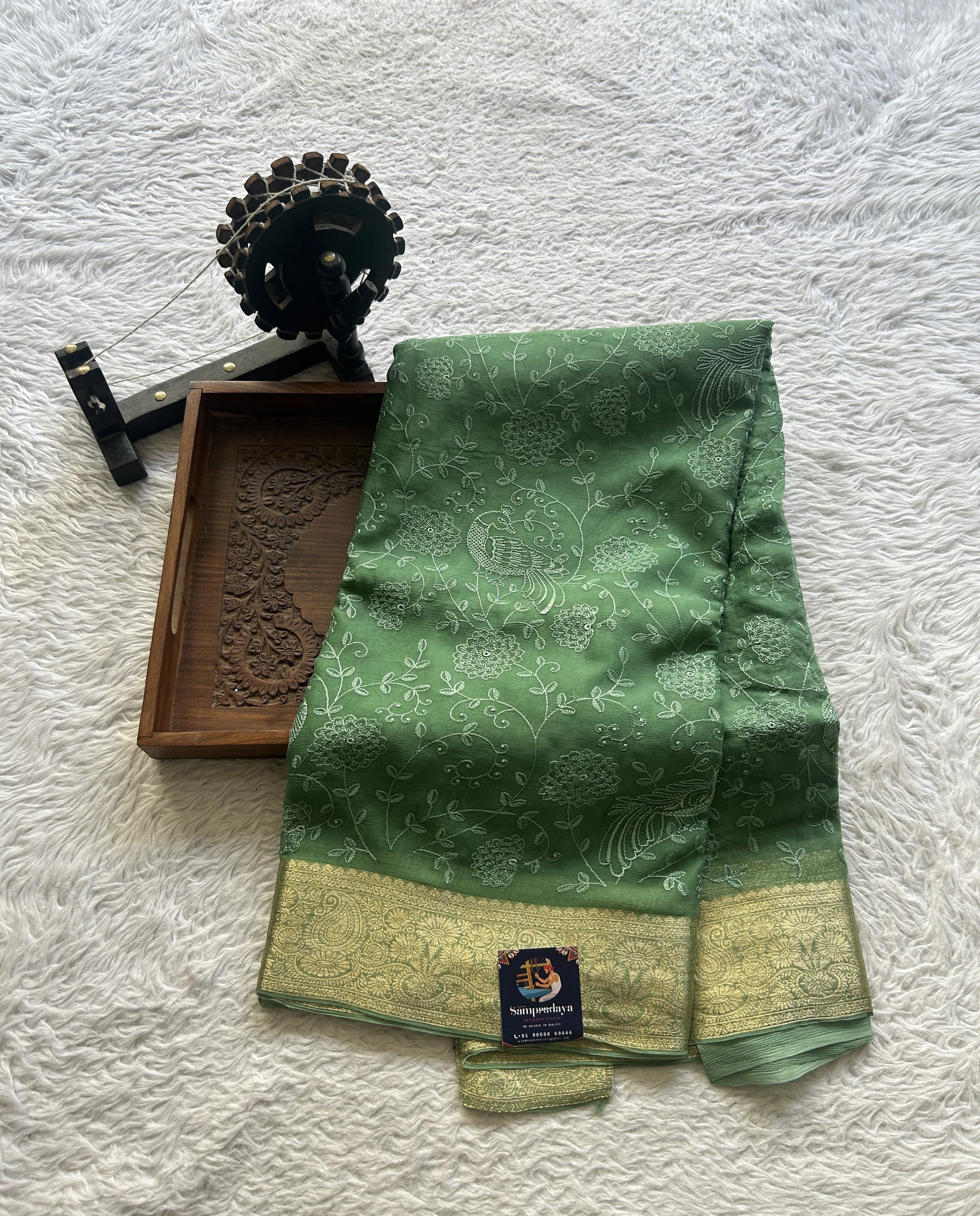 Semi Georgette Saree Jade Green Colored Elegantly Paired with a Zari Border. - Sampradaya Designer Studio