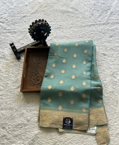 Semi Georgette Saree Sky Blue Colored Elegantly Paired with a Zari Border. - Sampradaya Designer Studio