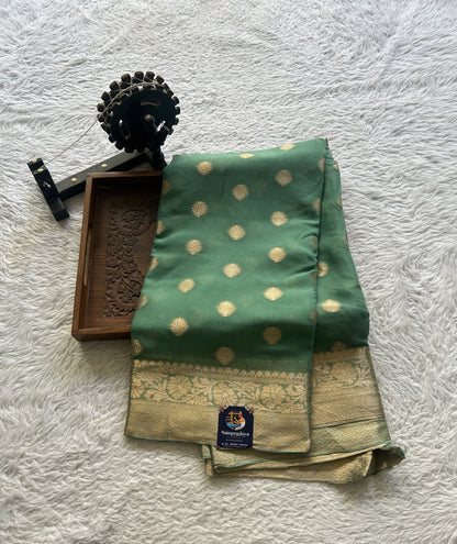 Semi Georgette Saree Fern Colored Elegantly Paired with a Zari Border. - Sampradaya Designer Studio