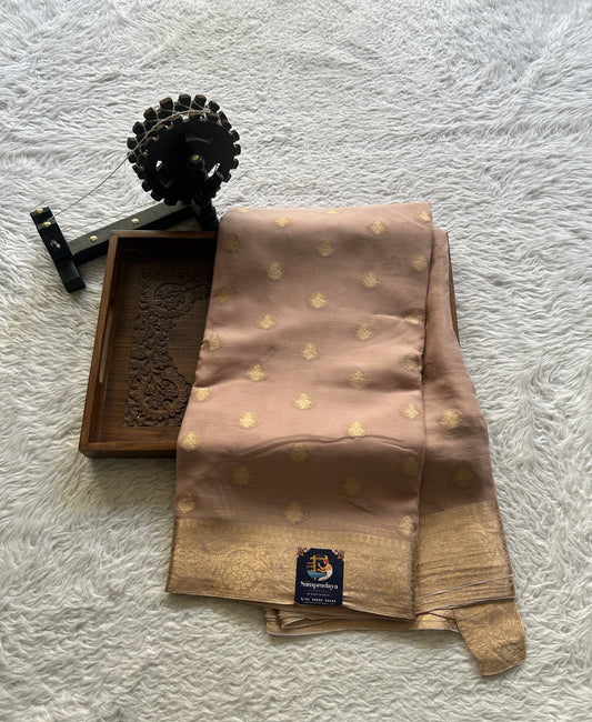 Semi Georgette Saree Very Light Peach Colored Elegantly Paired with a Zari Border. - Sampradaya Designer Studio