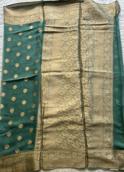 Semi Georgette Saree Dark Sea Green Colored Elegantly Paired with a Zari Border. - Sampradaya Designer Studio