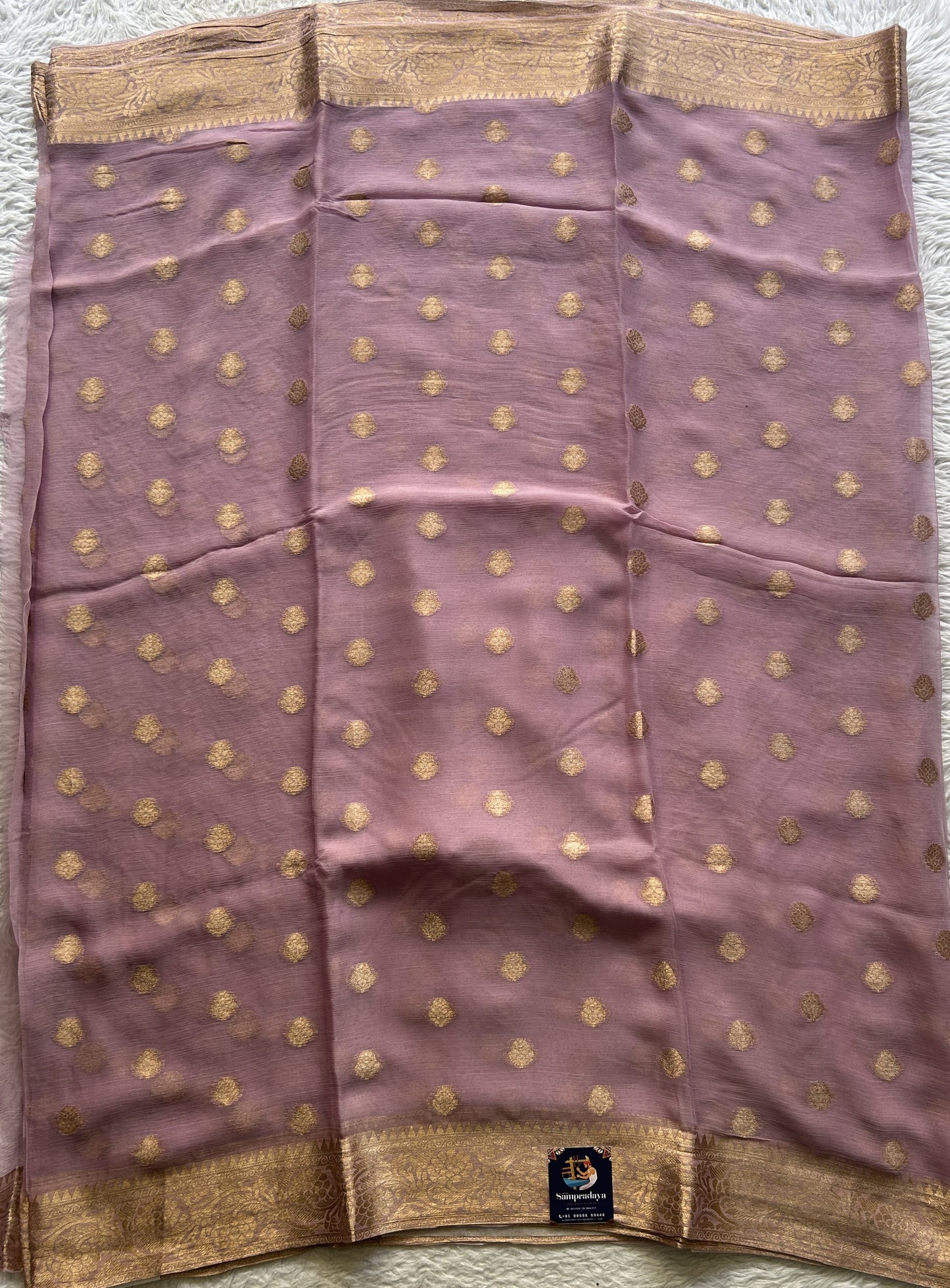 Semi Georgette Saree Light Lilac Colored Elegantly Paired with a Zari Border. - Sampradaya Designer Studio