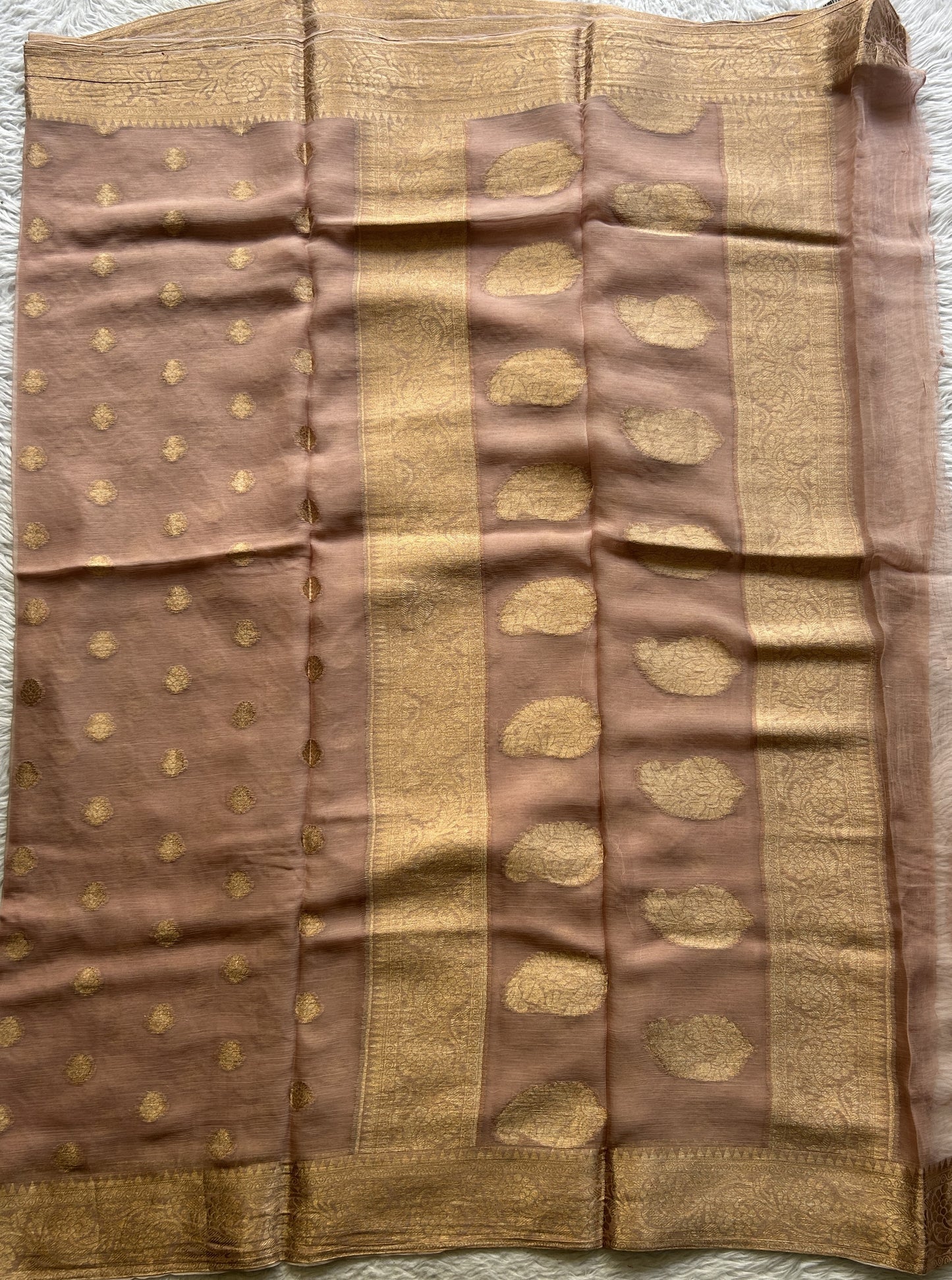 Semi Georgette Saree Very Light Peach Colored Elegantly Paired with a Zari Border. - Sampradaya Designer Studio
