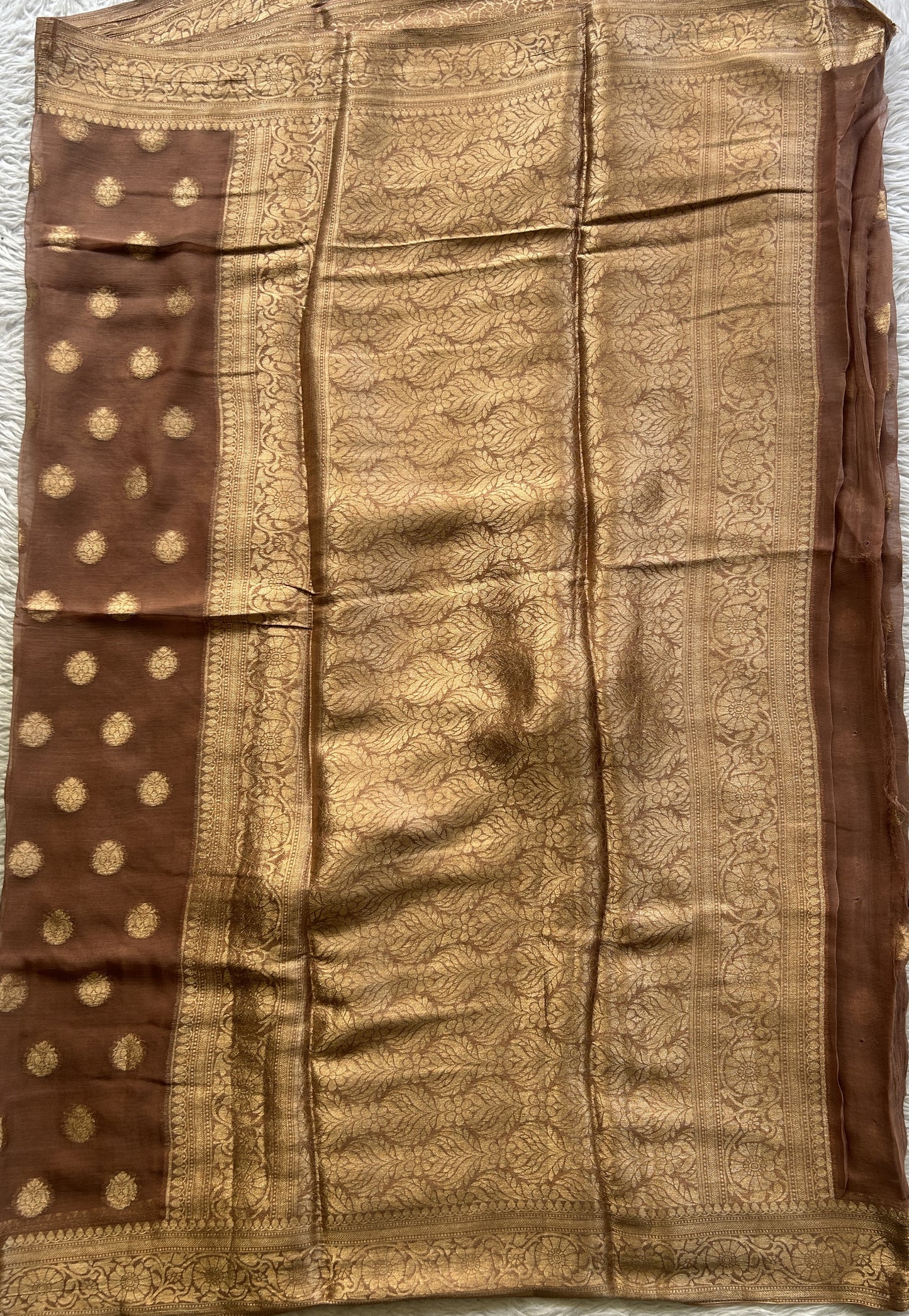 Semi Georgette Saree Peanut Colored Elegantly Paired with a Zari Border. - Sampradaya Designer Studio