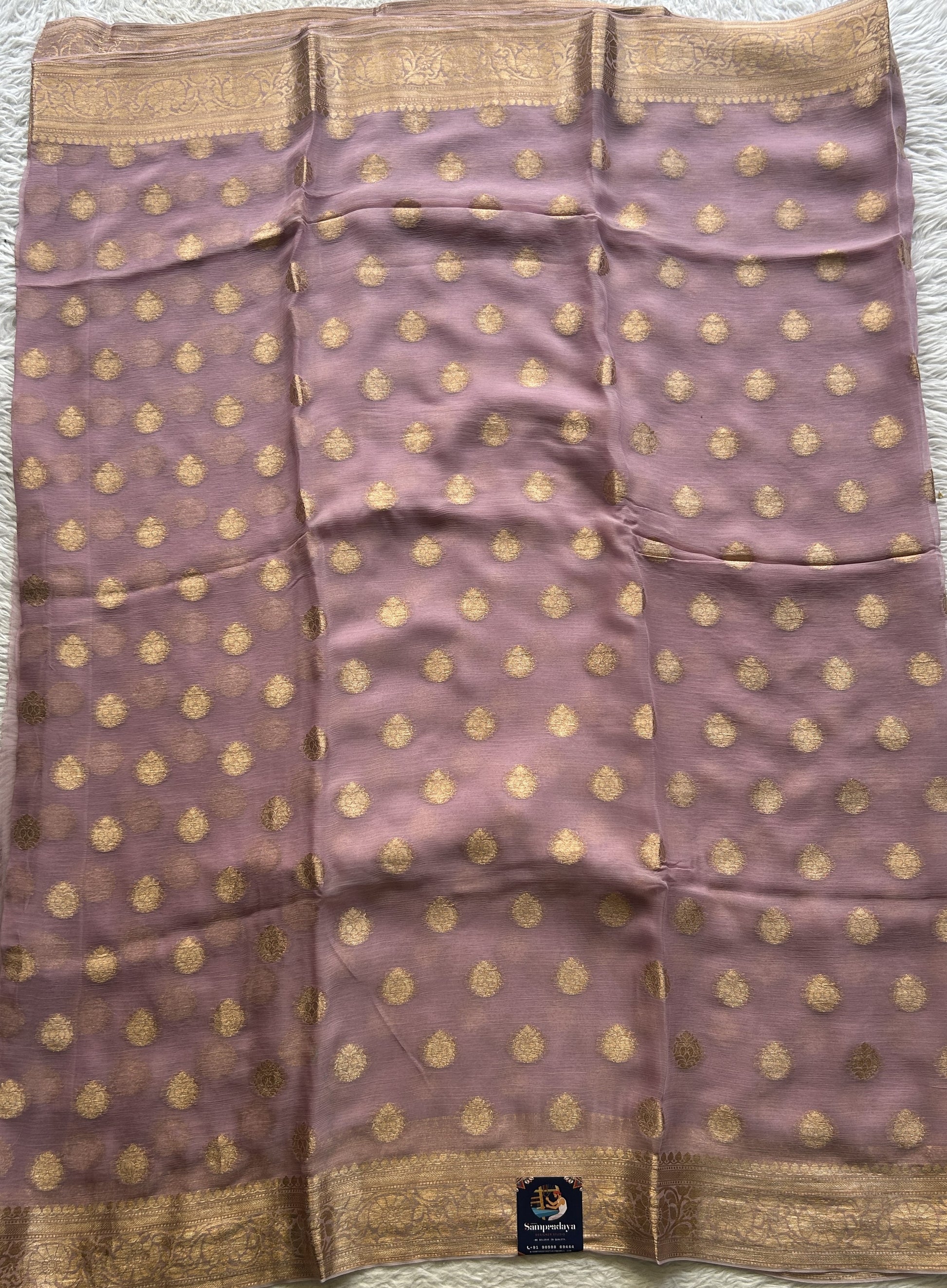 Semi Georgette Saree Light Lavender Colored Elegantly Paired with a Zari Border. - Sampradaya Designer Studio