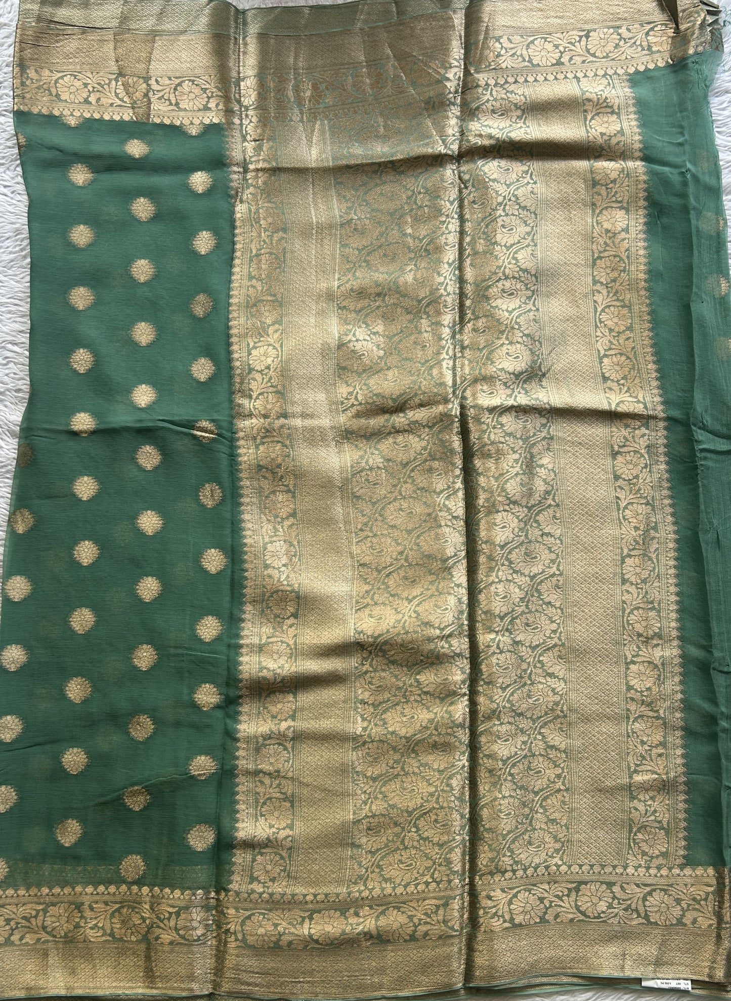 Semi Georgette Saree Fern Colored Elegantly Paired with a Zari Border. - Sampradaya Designer Studio