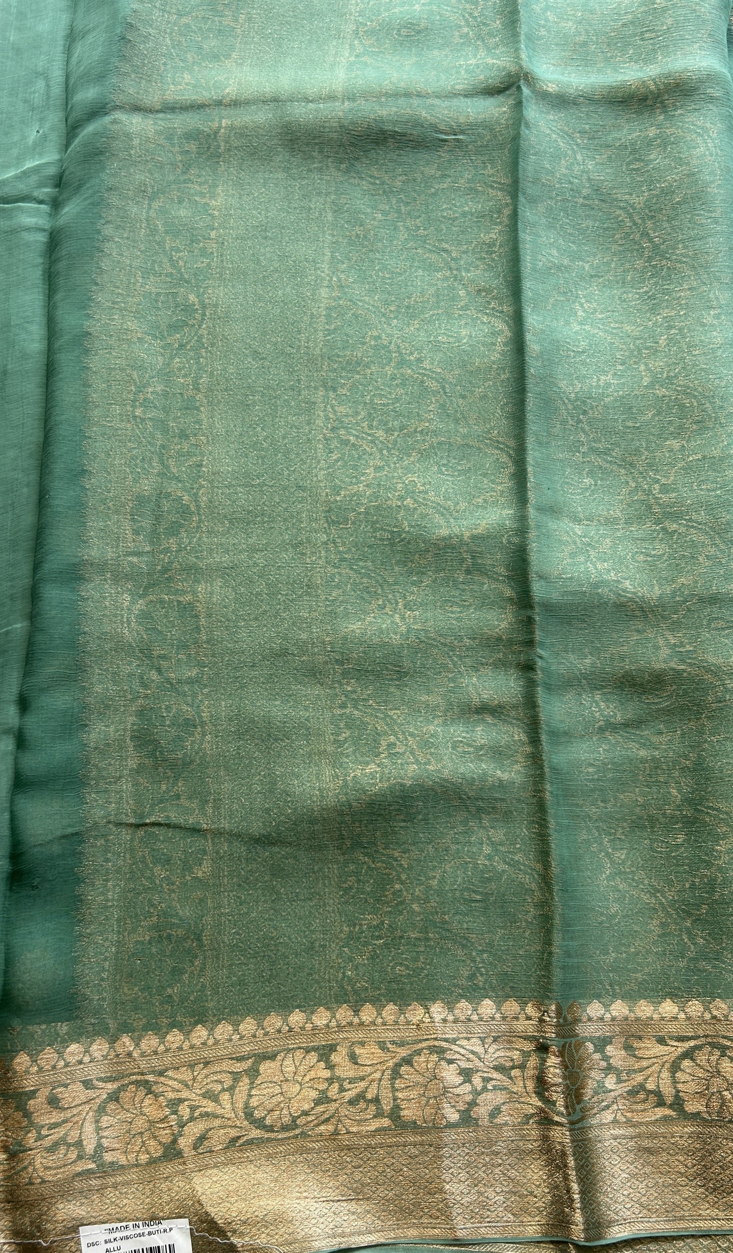 Semi Georgette Saree Fern Colored Elegantly Paired with a Zari Border. - Sampradaya Designer Studio