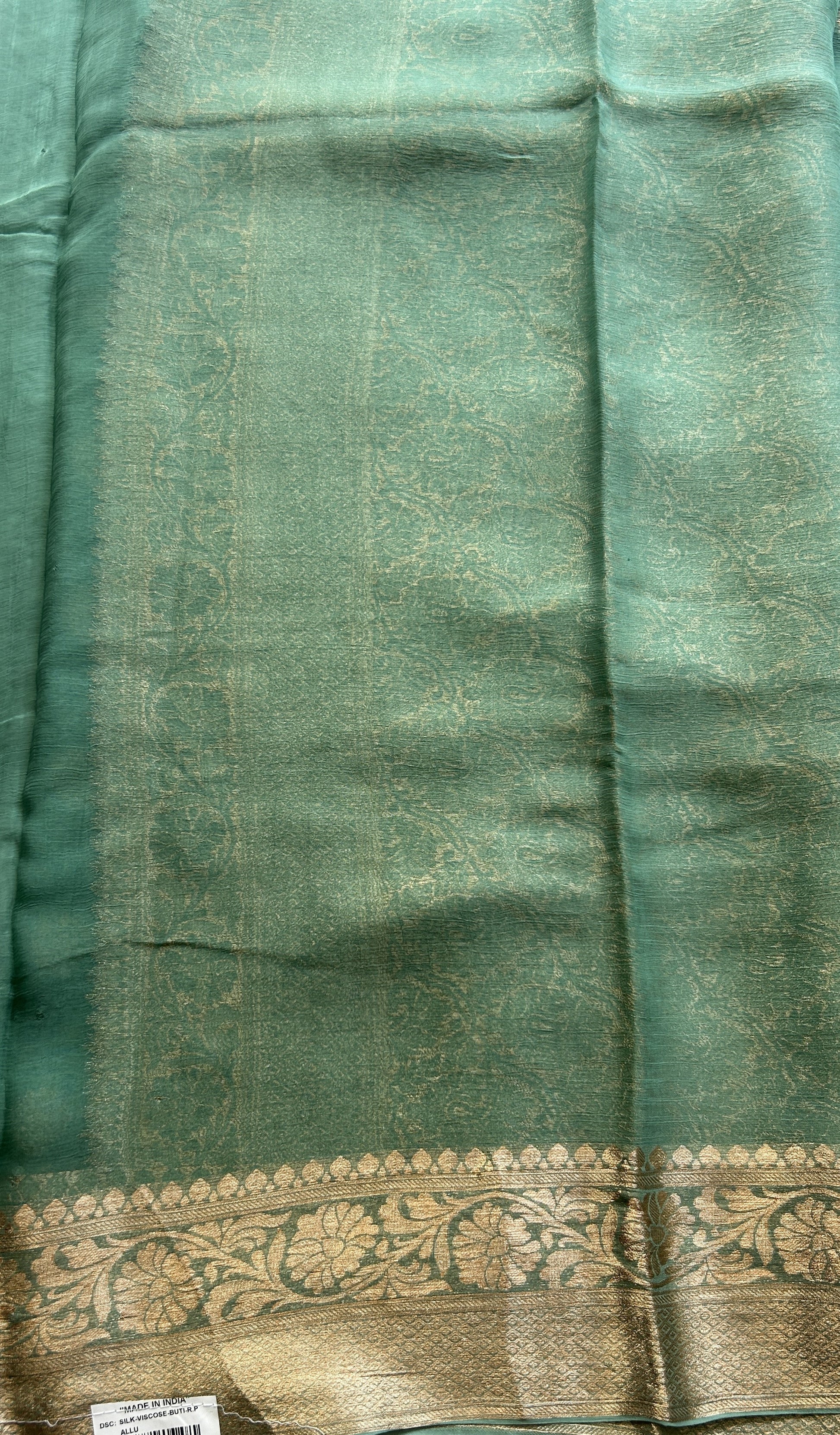 Semi Georgette Saree Fern Colored Elegantly Paired with a Zari Border. - Sampradaya Designer Studio