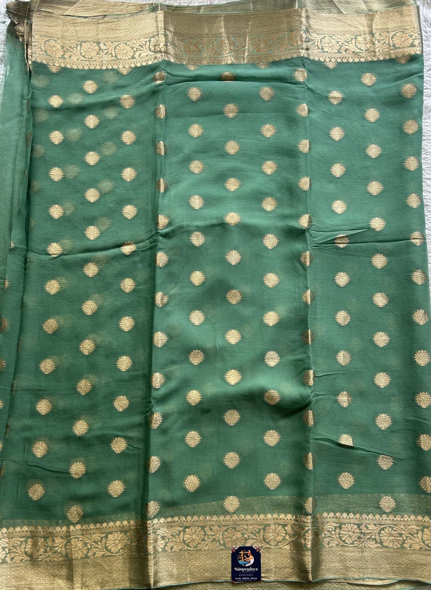 Semi Georgette Saree Fern Colored Elegantly Paired with a Zari Border. - Sampradaya Designer Studio