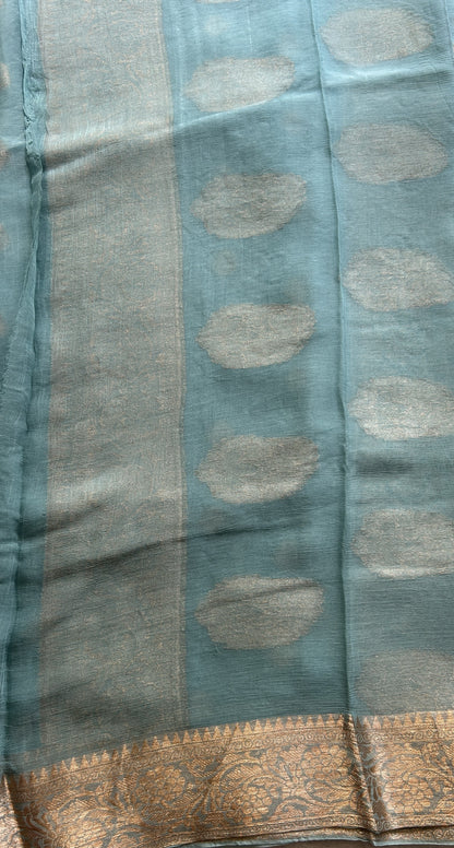 Semi Georgette Saree Sky Blue Colored Elegantly Paired with a Zari Border. - Sampradaya Designer Studio