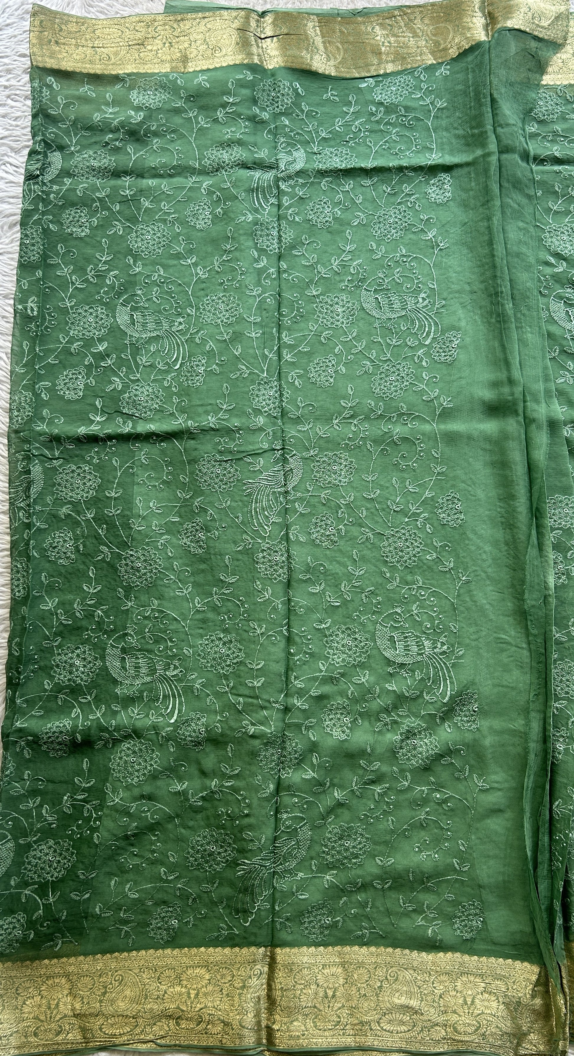 Semi Georgette Saree Jade Green Colored Elegantly Paired with a Zari Border. - Sampradaya Designer Studio