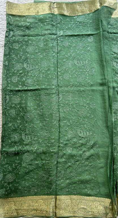 Semi Georgette Saree Jade Green Colored Elegantly Paired with a Zari Border. - Sampradaya Designer Studio