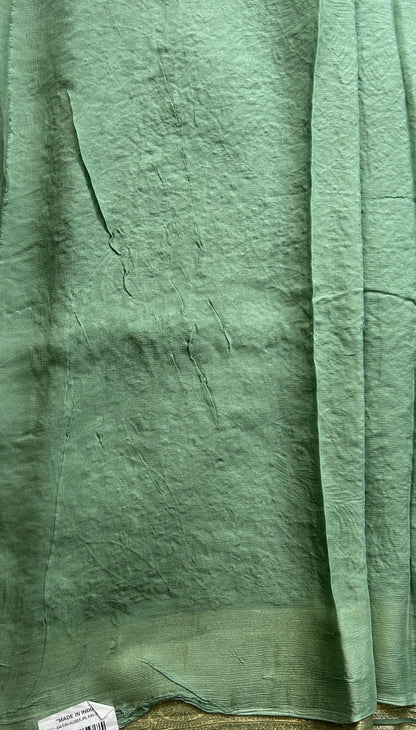 Semi Georgette Saree Jade Green Colored Elegantly Paired with a Zari Border. - Sampradaya Designer Studio