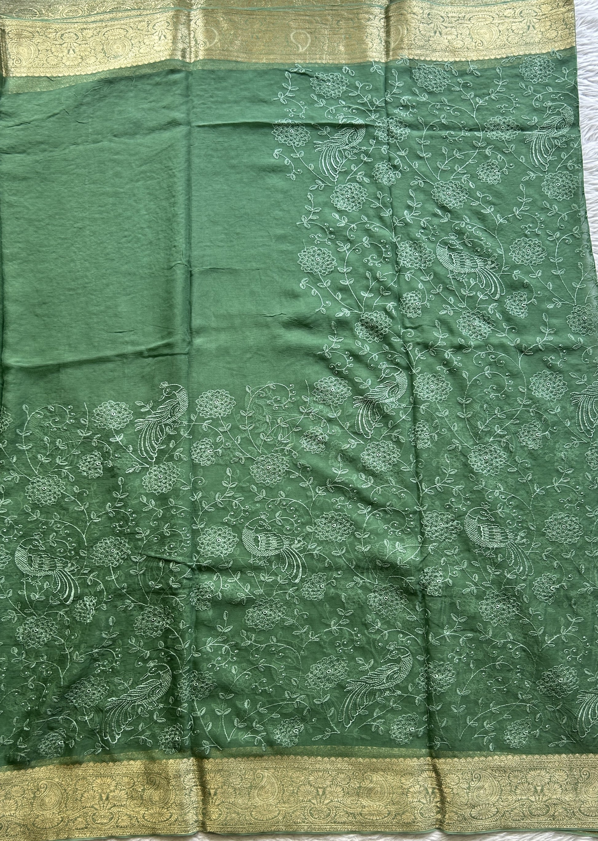 Semi Georgette Saree Jade Green Colored Elegantly Paired with a Zari Border. - Sampradaya Designer Studio