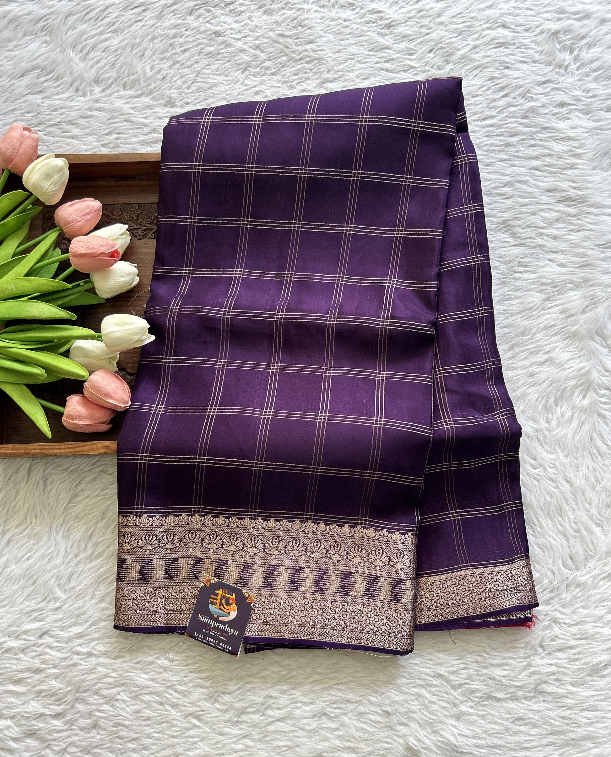 Satin Georgette Saree Purple Colored Complemented with a Zari Border. - Sampradaya Designer Studio