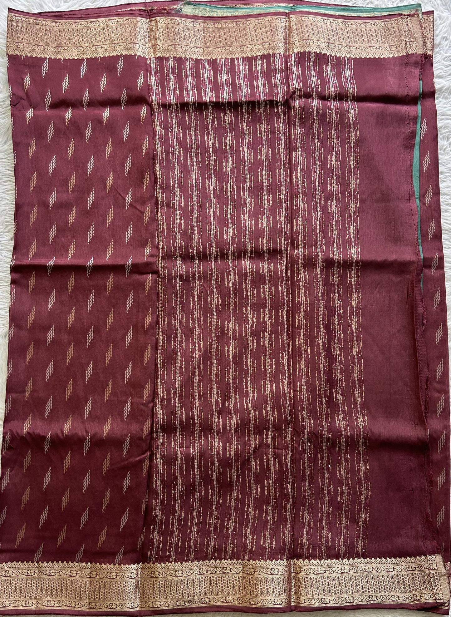 Semi Georgette Saree Burgundy Colored Complemented with a Zari Border. - Sampradaya Designer Studio
