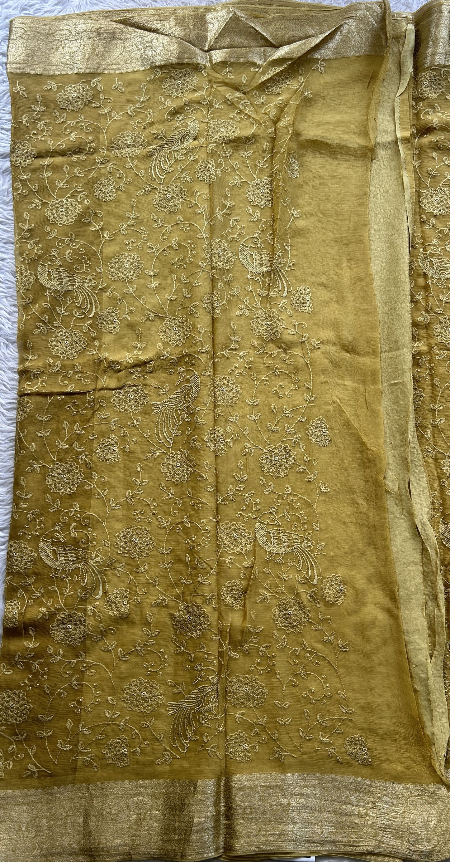Semi Georgette Saree Canary Colored Elegantly Paired with a Zari Border. - Sampradaya Designer Studio