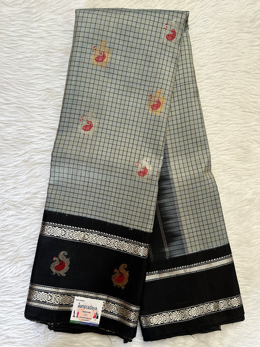 Gadwal Pattu Saree Gray Colored Checks Complemented With a Pattu Black Color Kanchi Border - Sampradaya Designer Studio