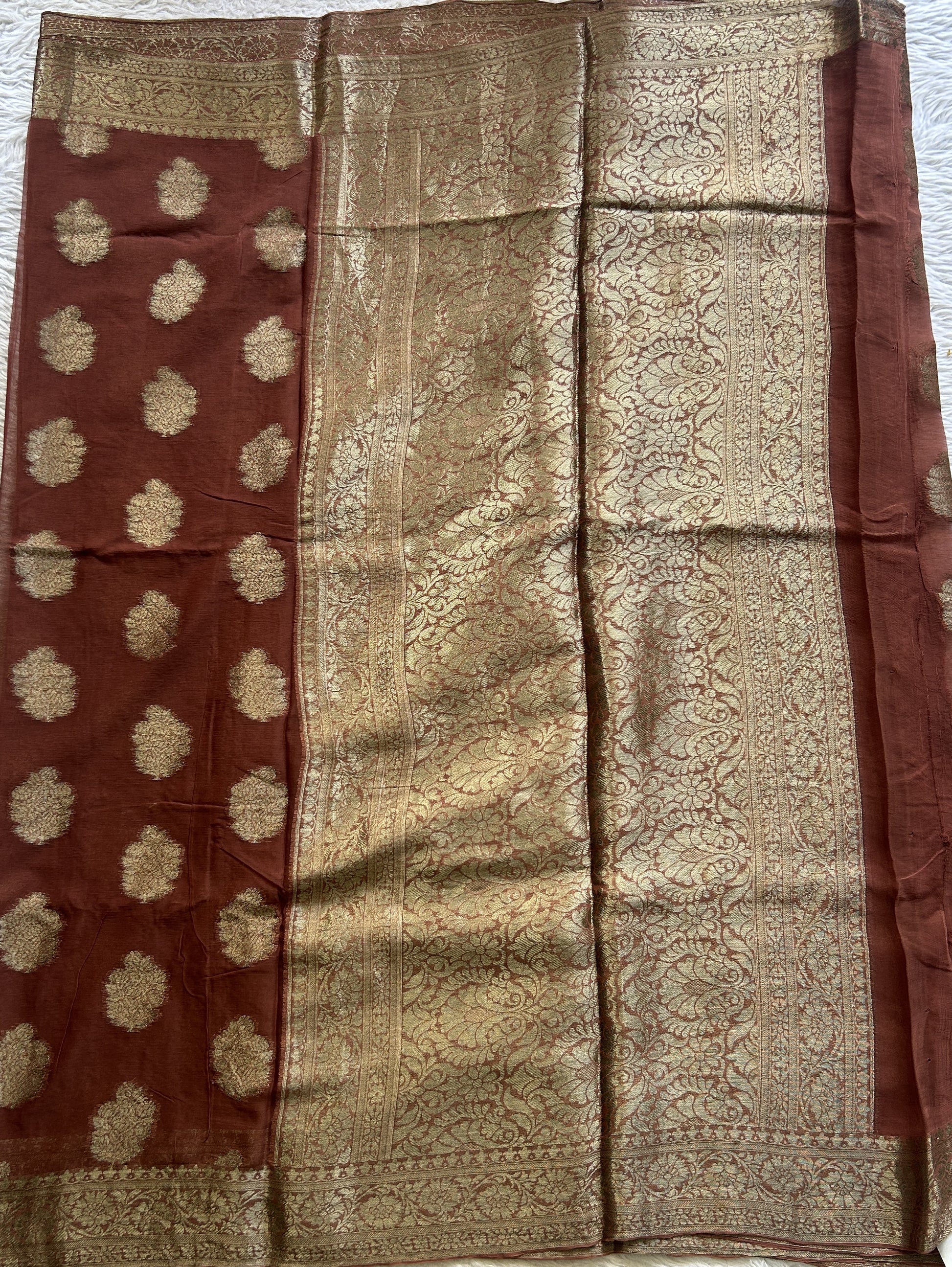 Semi Georgette Saree Brown Colored Elegantly Paired with a Zari Border. - Sampradaya Designer Studio