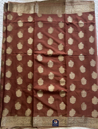 Semi Georgette Saree Brown Colored Elegantly Paired with a Zari Border. - Sampradaya Designer Studio