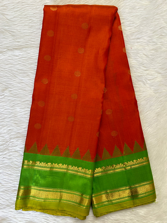 Gadwal Pattu Saree Orange Colored Complemented With a Pattu Green Color Kanchi Gap Border - Sampradaya Designer Studio