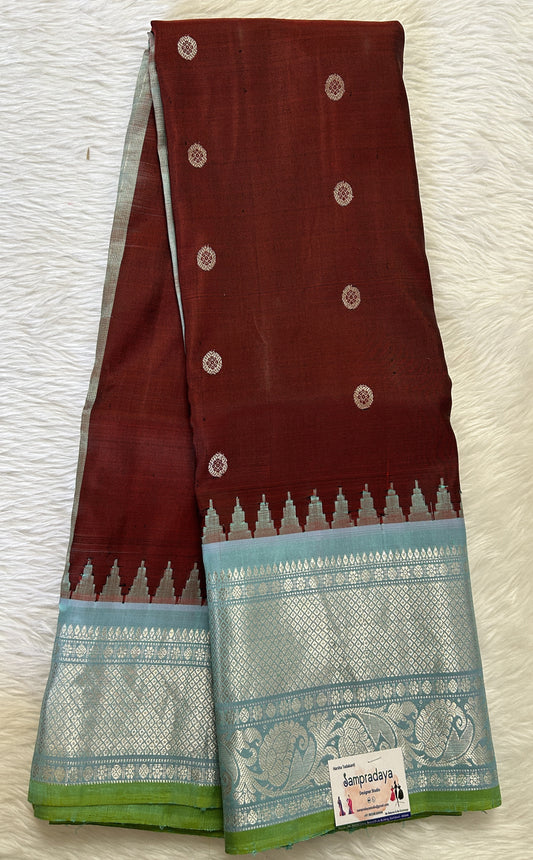 Gadwal Pattu Saree Brown Colored Complemented With a Pattu Pastel Blue Color Kanchi Border - Sampradaya Designer Studio