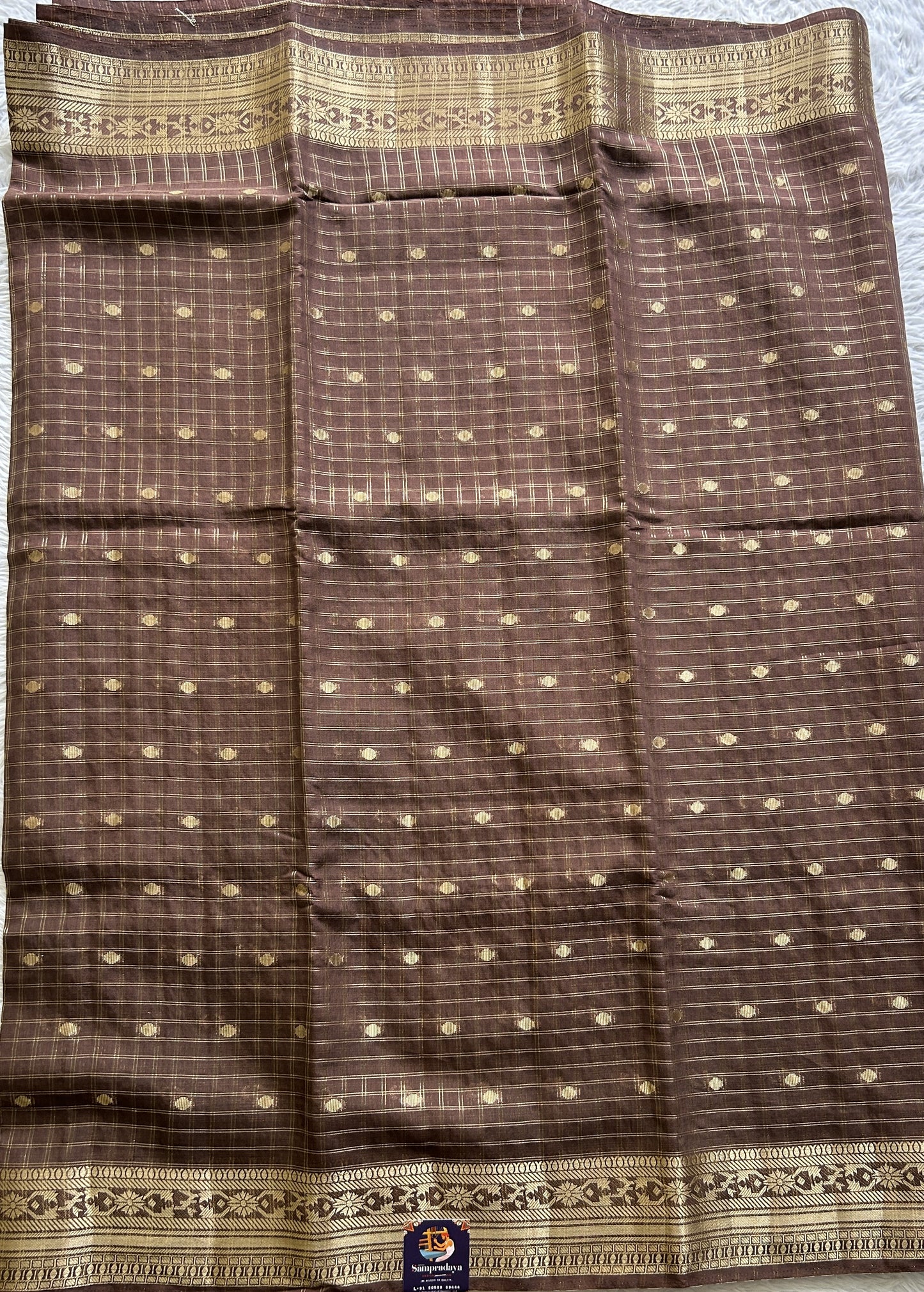 Semi Georgette Saree Brown Colored Complemented with a Zari Border. - Sampradaya Designer Studio
