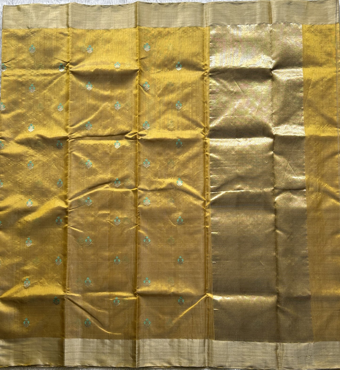 Chanderi Tissue Saree  Amber color Elegantly Paired with a Silver Zari Border - Sampradaya Designer Studio