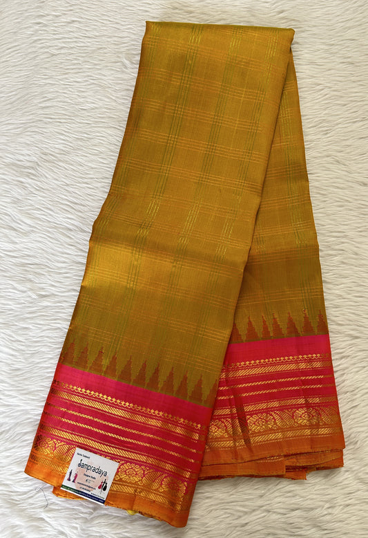 Gadwal Pattu Saree Mustard Yellow Colored Complemented With a Pattu Rose Pink Color Kanchi Border - Sampradaya Designer Studio
