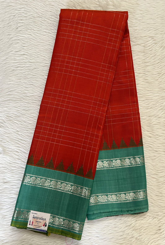 Gadwal Pattu Saree Dark Orange Colored Complemented With a Pattu Russian Green Color Kanchi Gap Border - Sampradaya Designer Studio