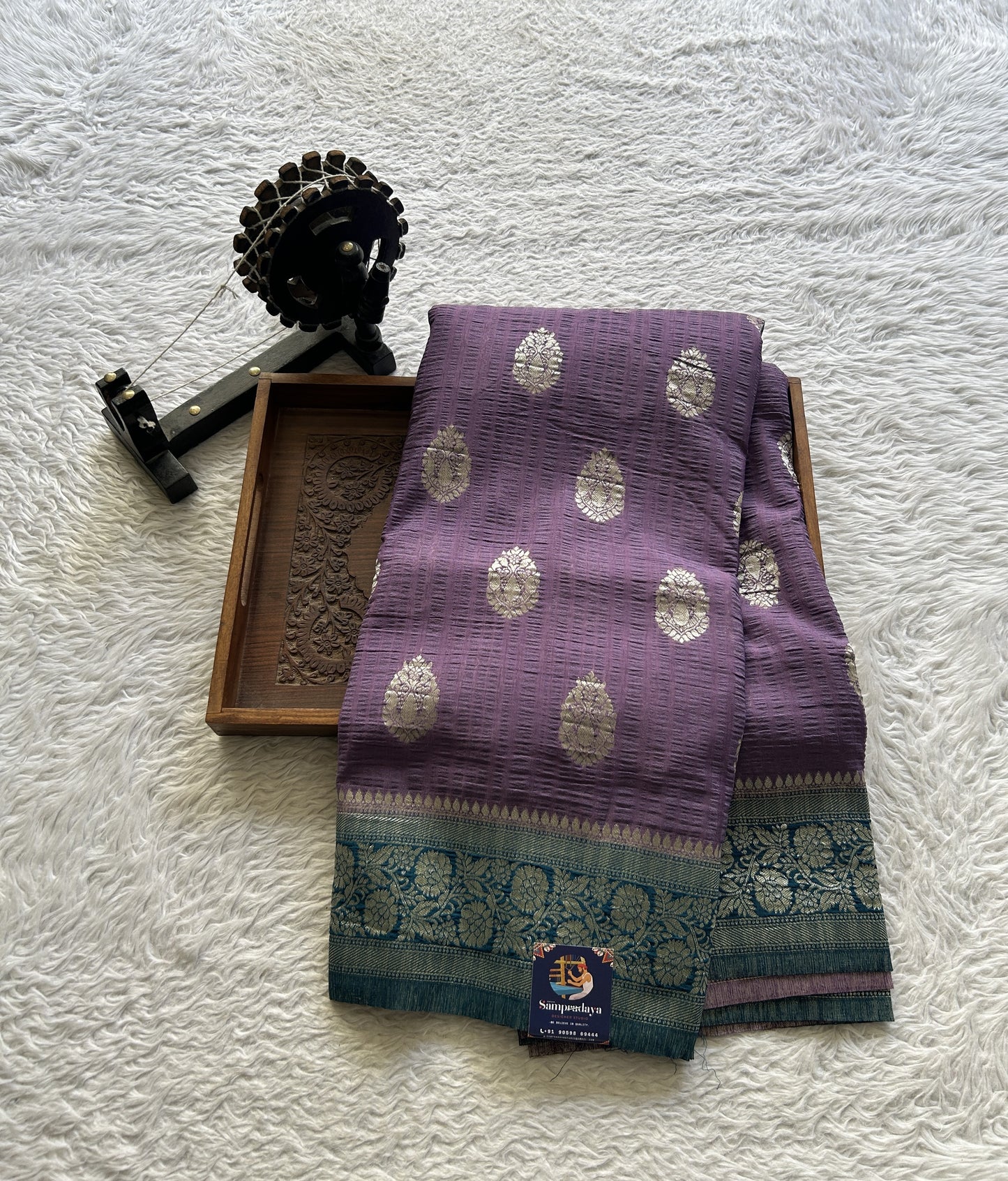 Semi Georgette Saree Lavender Colored Complemented with a Peacock Blue Zari Border. - Sampradaya Designer Studio