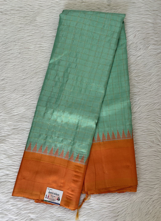 Gadwal Pattu Saree Sea Green Colored Saree Complemented With a Pattu Pastel Orange Color Plain Border - Sampradaya Designer Studio