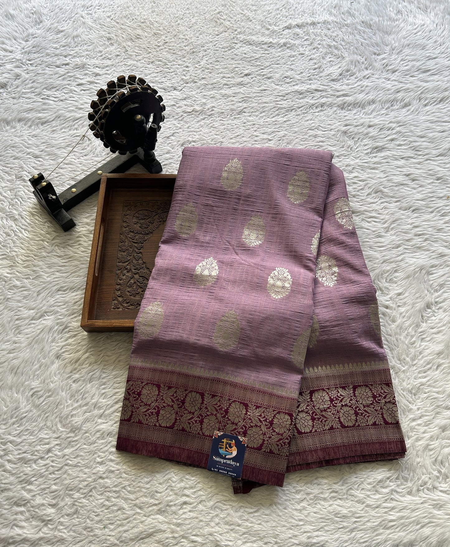 Semi Georgette Saree Lavender Colored Complemented with a Purple Zari Border. - Sampradaya Designer Studio
