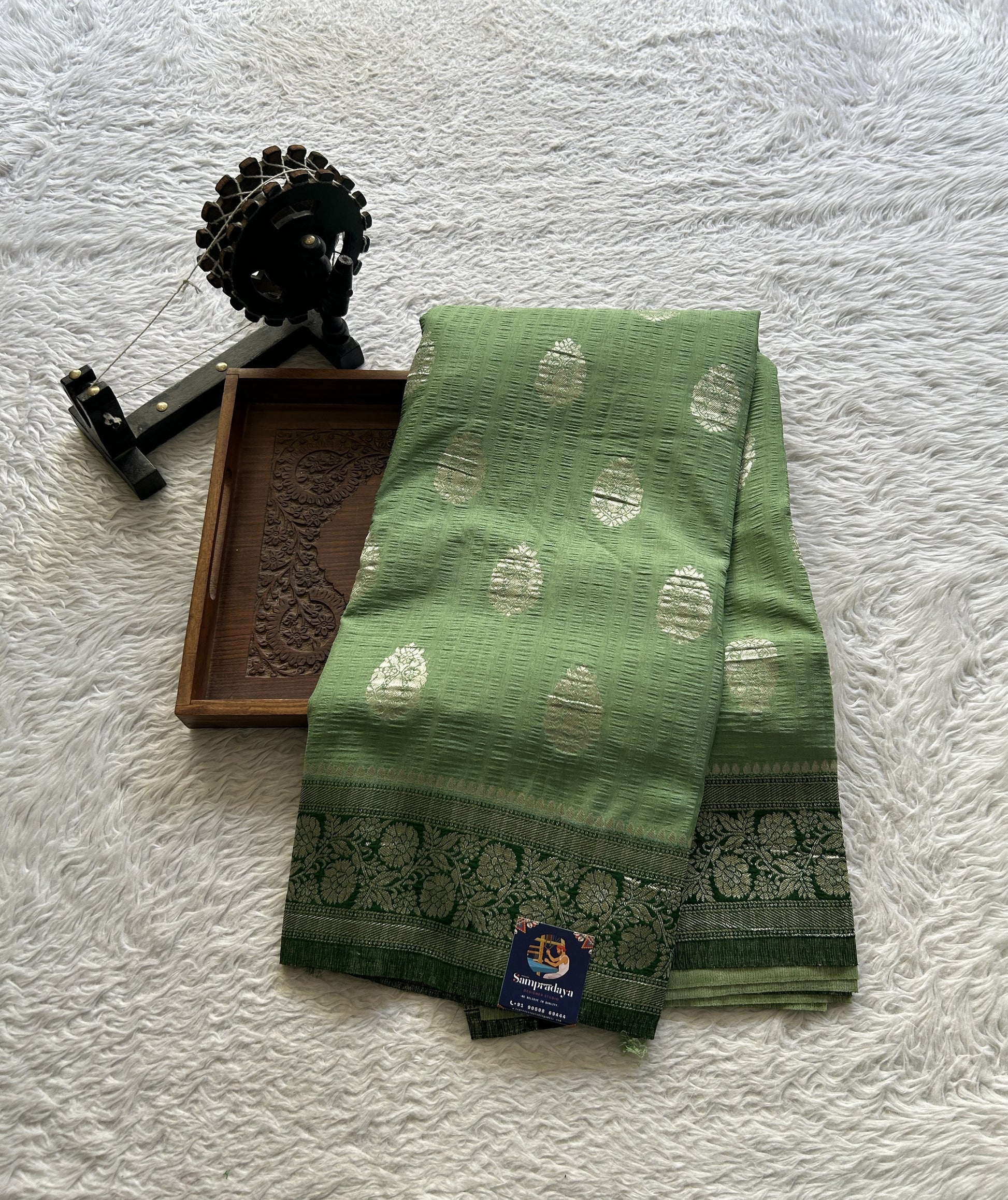 Semi Georgette Saree Pastel Green Colored Complemented with a Zari Border. - Sampradaya Designer Studio