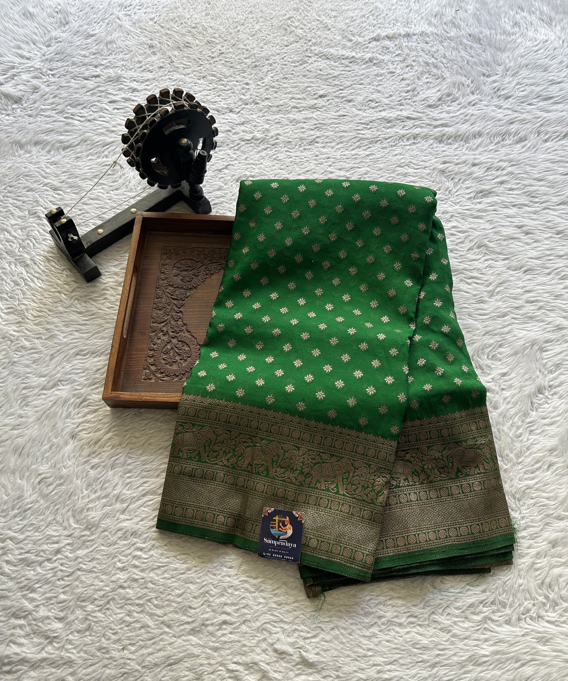 Semi Georgette Saree Leaf Green Colored Complemented with a Zari Border. - Sampradaya Designer Studio