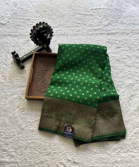 Semi Georgette Saree Leaf Green Colored Complemented with a Zari Border. - Sampradaya Designer Studio